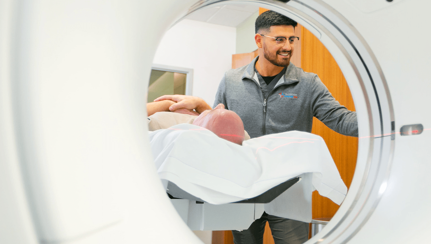 Man operating medical machine
